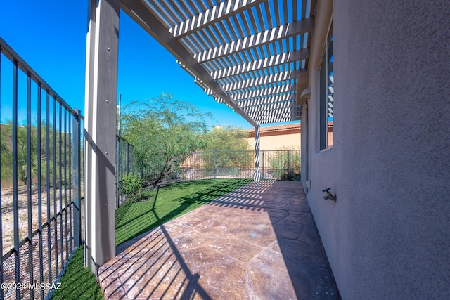 view of patio featuring a pergola