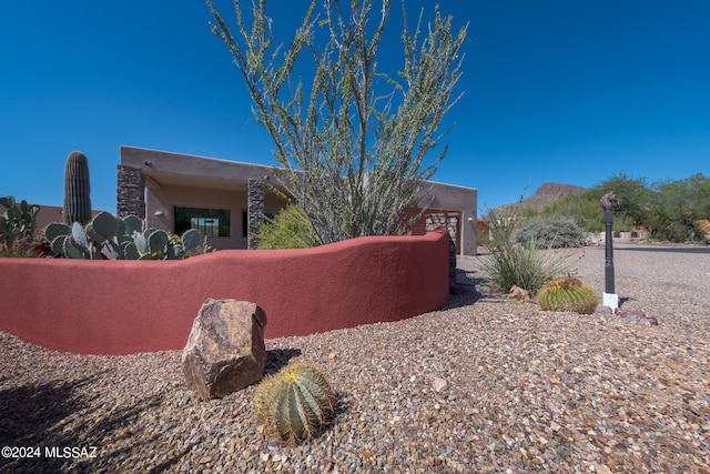 exterior space with a mountain view