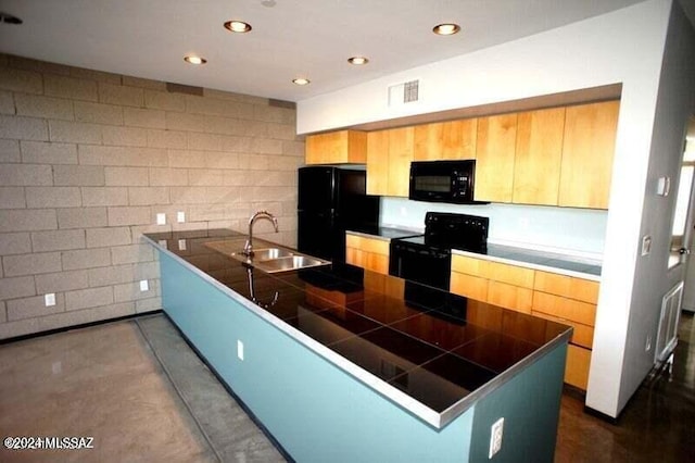 kitchen with light brown cabinets, tile countertops, sink, kitchen peninsula, and black appliances