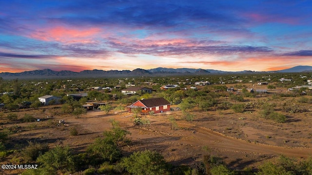 aerial view at dusk with a mountain view