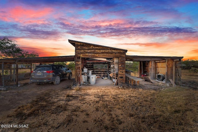 view of outdoor structure at dusk