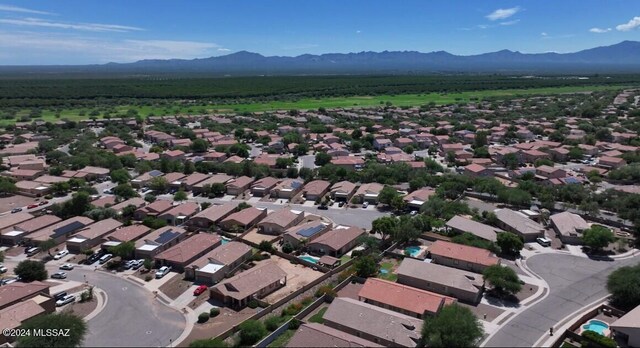 drone / aerial view featuring a mountain view