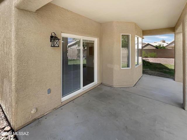 view of patio with fence