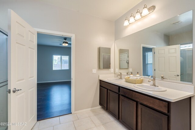 bathroom featuring vanity, hardwood / wood-style flooring, and ceiling fan