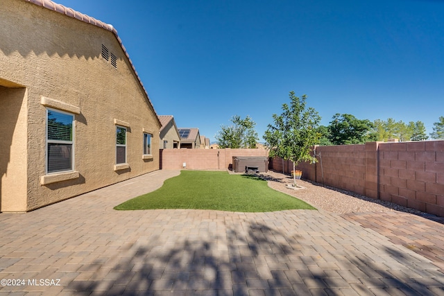 view of yard featuring a fenced backyard and a patio