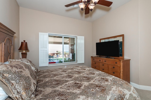 bedroom with ceiling fan, baseboards, and carpet floors