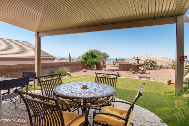 view of patio / terrace with outdoor dining area and a fenced backyard