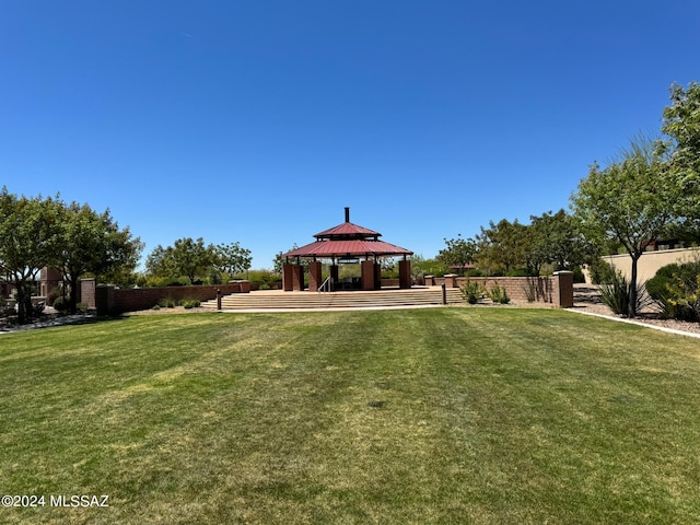 view of community featuring a gazebo and a yard