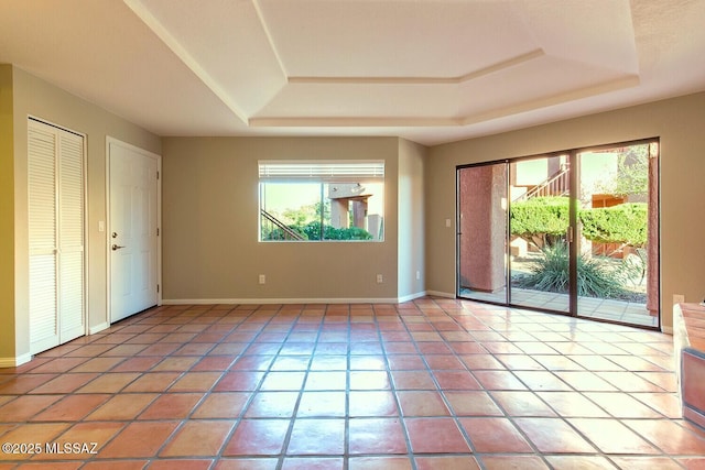 interior space with a tray ceiling