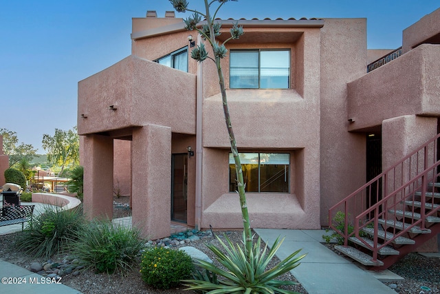 rear view of house with a patio area