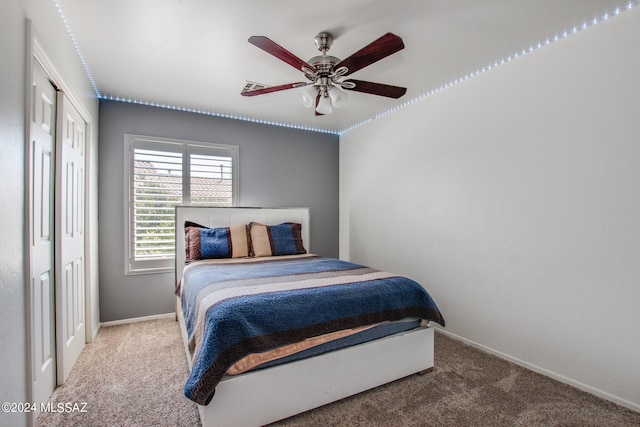 bedroom featuring a closet, ceiling fan, and carpet floors