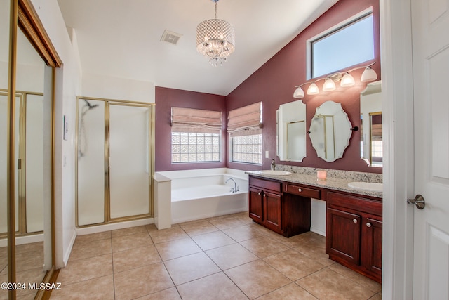 bathroom featuring a notable chandelier, tile patterned floors, vanity, vaulted ceiling, and shower with separate bathtub