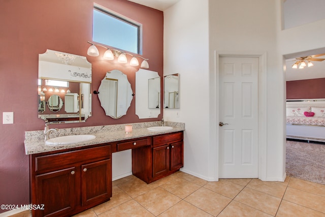 bathroom featuring vanity, ceiling fan, and tile patterned floors