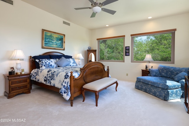 carpeted bedroom with ceiling fan