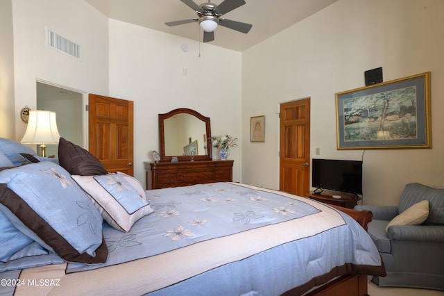 bedroom with vaulted ceiling and ceiling fan