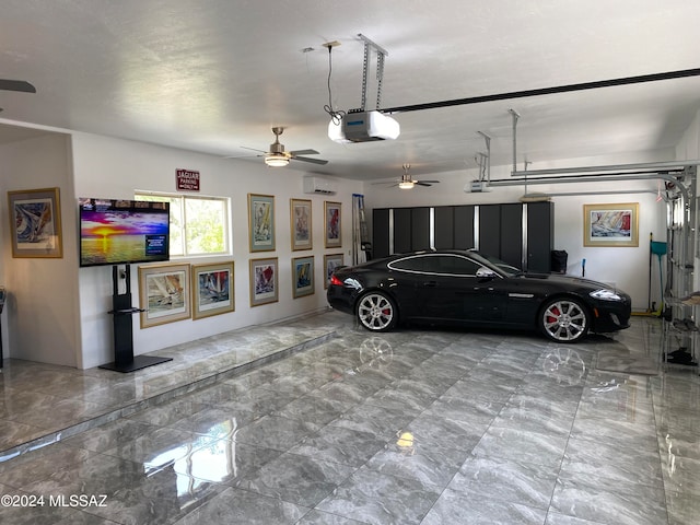 garage with a garage door opener and a wall unit AC