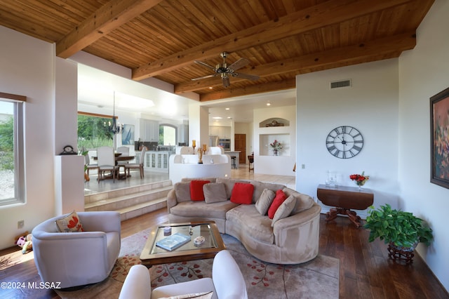 living room with wood ceiling, hardwood / wood-style flooring, beamed ceiling, and ceiling fan