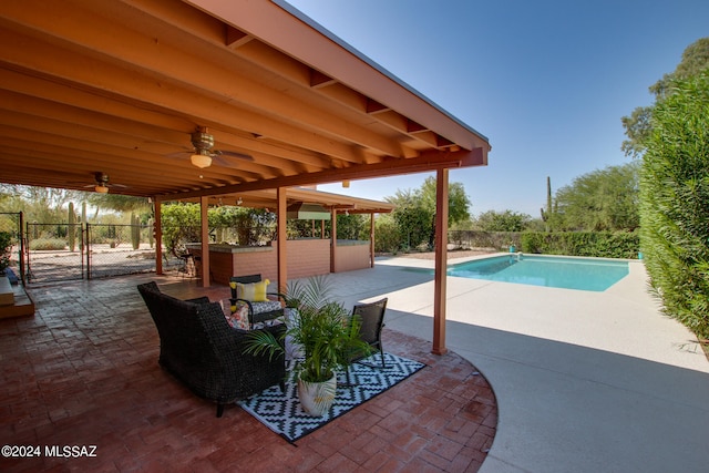 view of patio / terrace featuring ceiling fan