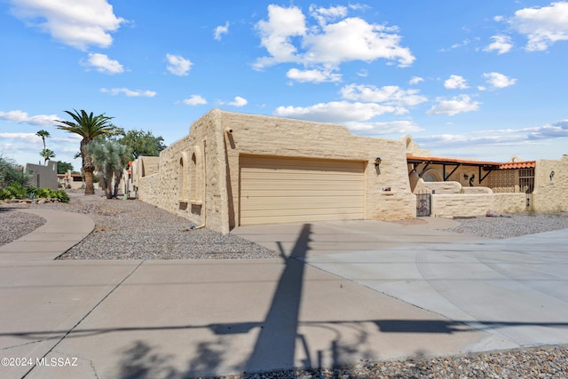 view of front of home featuring a garage