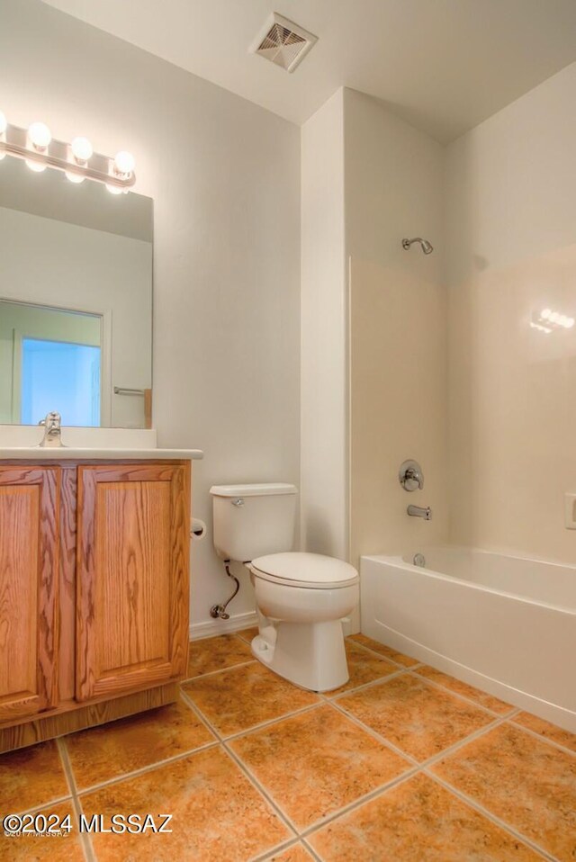 full bathroom with shower / bathing tub combination, vanity, toilet, and tile patterned flooring