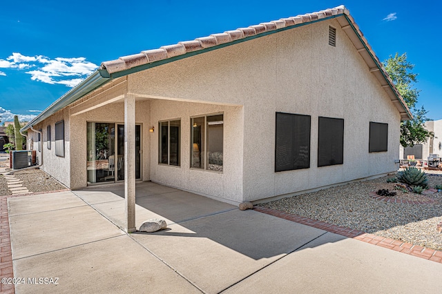 back of house featuring a patio