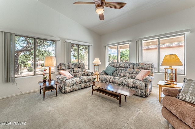 living room featuring light carpet, vaulted ceiling, and ceiling fan