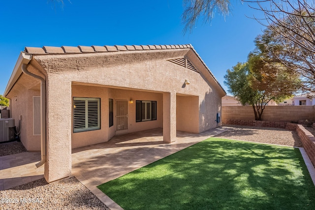 back of house featuring a patio and central AC unit