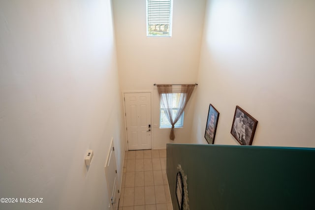 952 E Empire Canyon Ln, Sahuarita, AZ 85629 - interior space featuring light tile patterned floors, plenty of natural light, and a towering ceiling