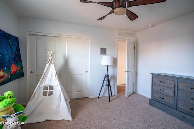 recreation room with visible vents, baseboards, a ceiling fan, and carpet floors