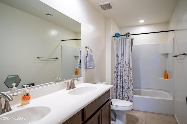 full bath featuring a sink, visible vents, and tile patterned flooring
