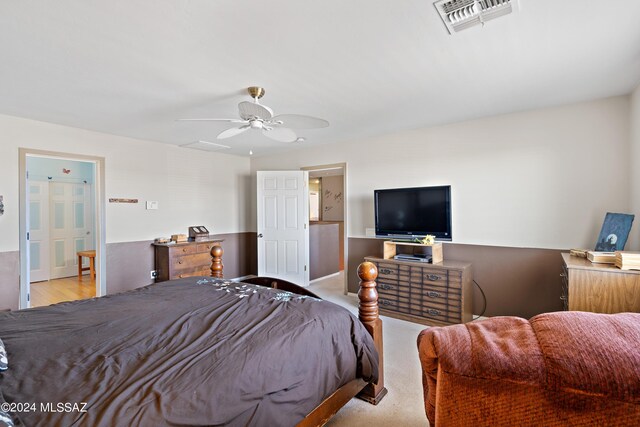 carpeted bedroom with ceiling fan