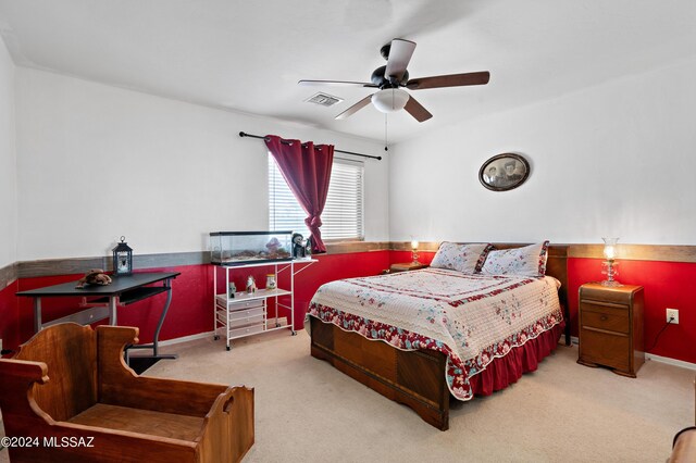 bedroom featuring ceiling fan and carpet flooring