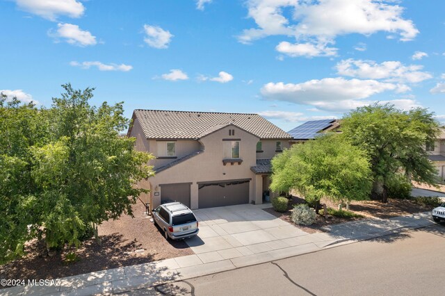 view of front of property featuring a garage