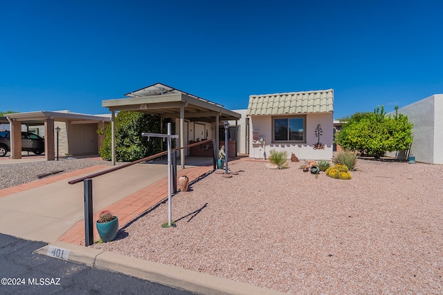 view of front of property with a carport