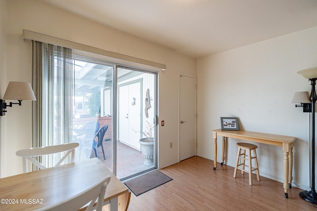 doorway to outside featuring light hardwood / wood-style floors