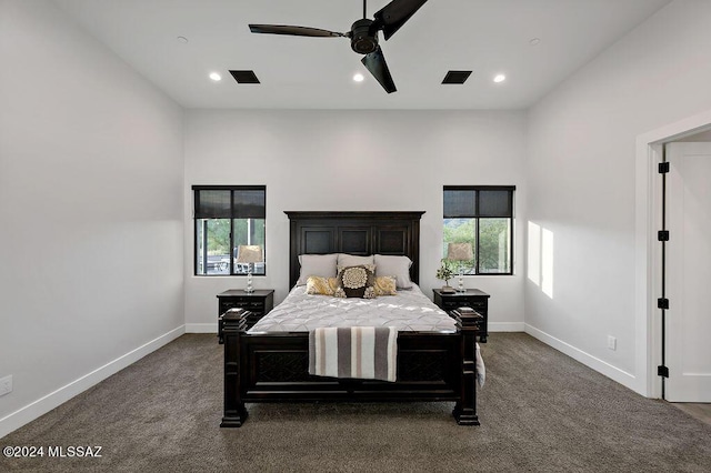 bedroom featuring visible vents, dark carpet, recessed lighting, baseboards, and ceiling fan