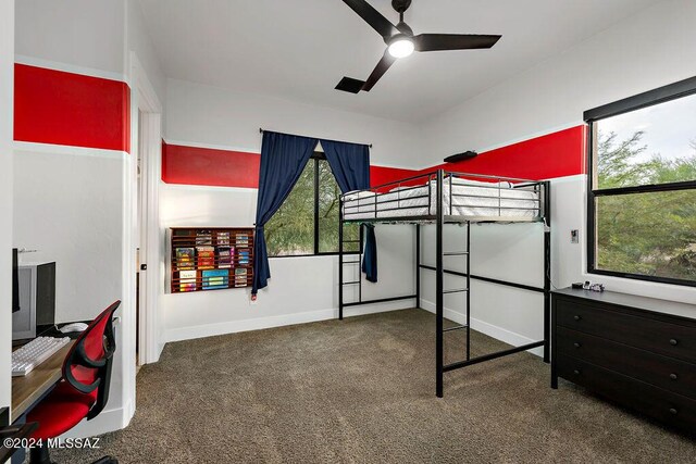 bedroom with carpet flooring and baseboards