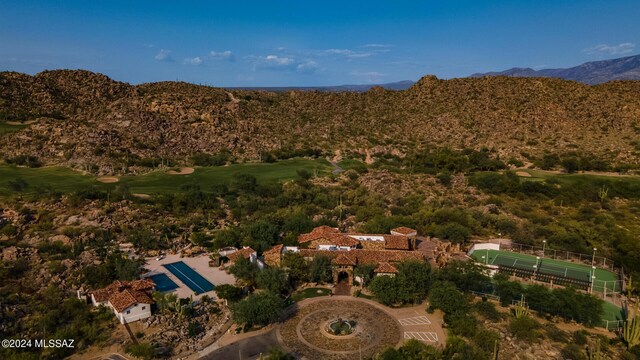 birds eye view of property featuring a mountain view