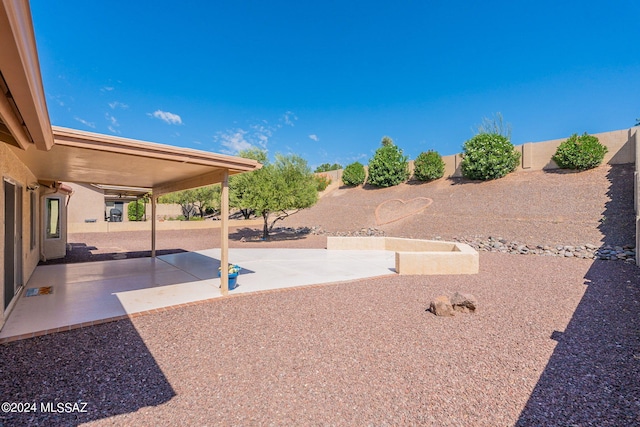 view of yard with a fenced backyard and a patio area