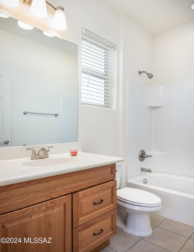 full bathroom featuring vanity, tub / shower combination, tile patterned flooring, and toilet