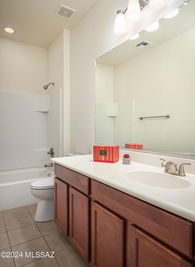 bathroom featuring toilet, vanity, tile patterned flooring, and visible vents