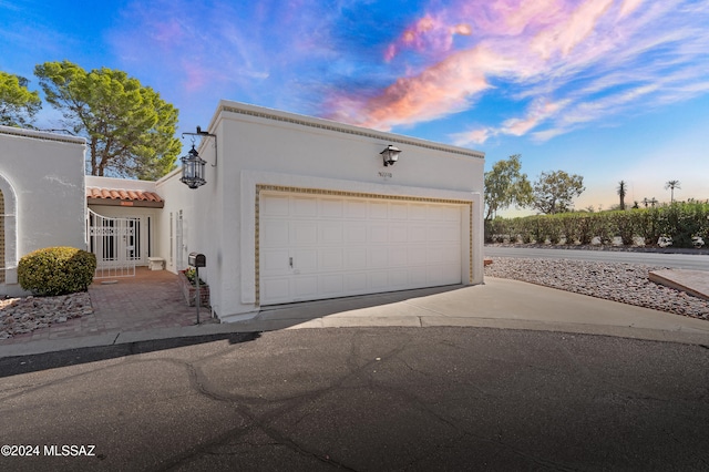 view of front of property featuring a garage