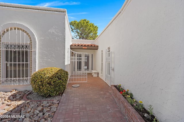 entrance to property featuring french doors