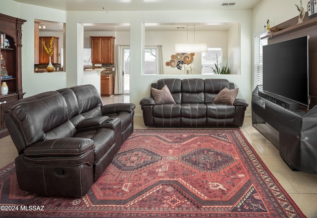 living room featuring light tile patterned floors