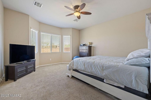bedroom featuring baseboards, ceiling fan, carpet, and visible vents
