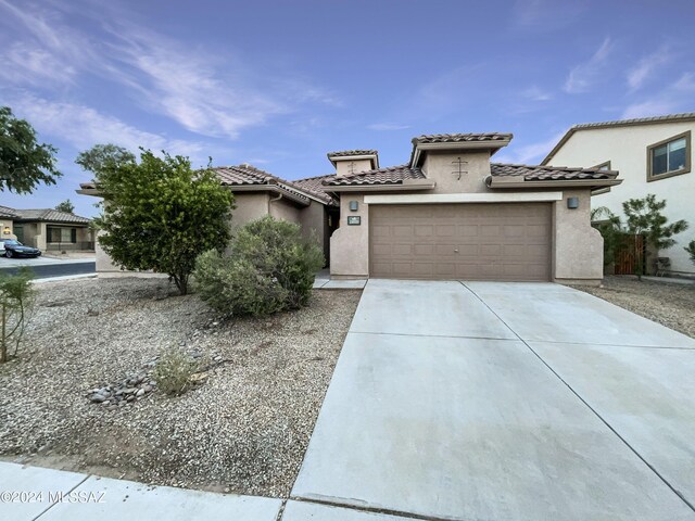 view of front of property featuring a garage