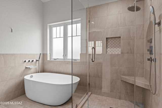 9797 E Holden Pl, Tucson, AZ 85748 - full bath featuring a stall shower, a freestanding tub, and tile walls