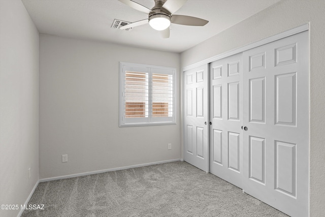 9797 E Holden Pl, Tucson, AZ 85748 - unfurnished bedroom with carpet floors, a closet, and ceiling fan