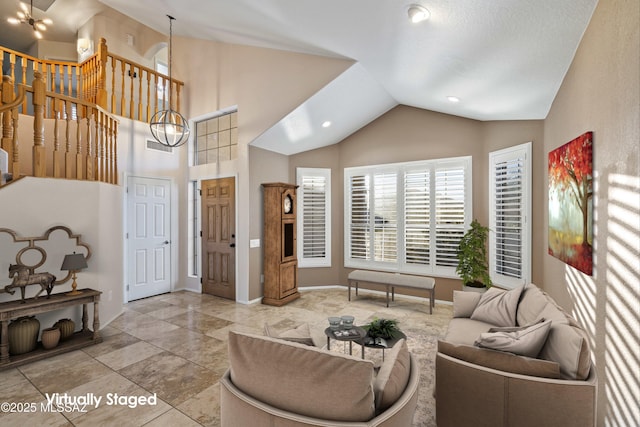 9797 E Holden Pl, Tucson, AZ 85748 - living area featuring vaulted ceiling, recessed lighting, and a chandelier