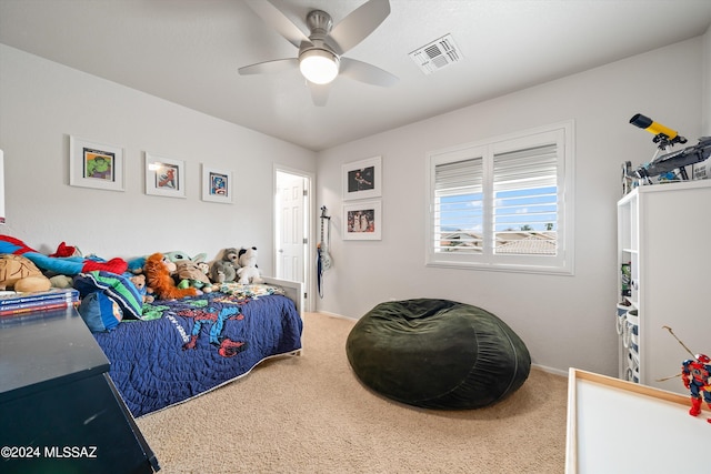 carpeted bedroom featuring ceiling fan